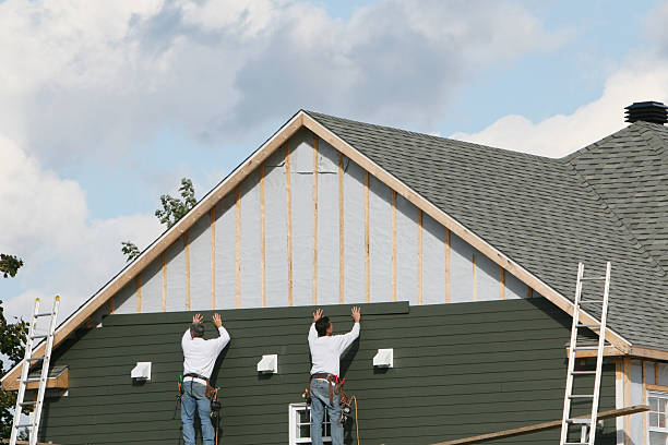 Professional Siding Contractor technician working in Roanoke, TX